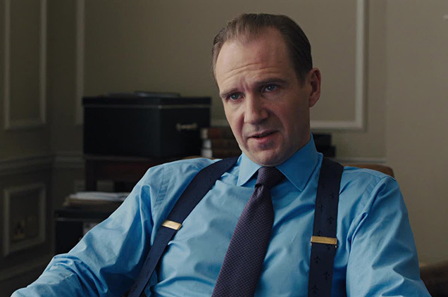 Gareth Mallory (played by Ralph Fiennes) wears a pair of Ede & Ravenscroft Dark Blue Fleur De Lys braces in SkyFall