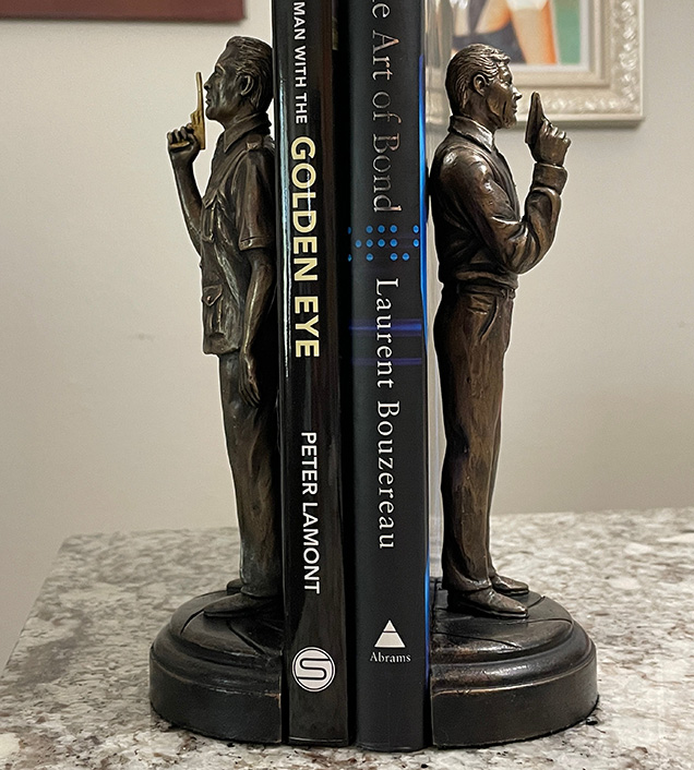 The James Bond & Francisco Scaramanga bronze sculptures make perfect book stands.